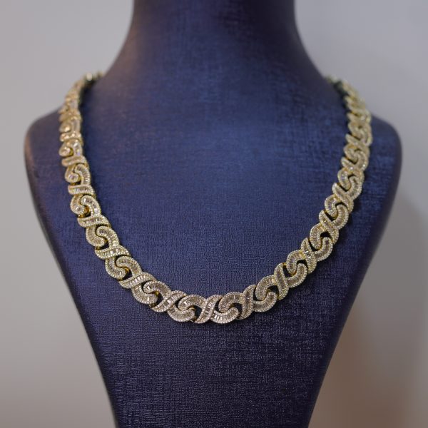 Diamond dancing gold-tone iced link chain