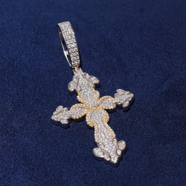 Diamond Dancing stunning iced-out cross pendant passes the diamond tester with confidence