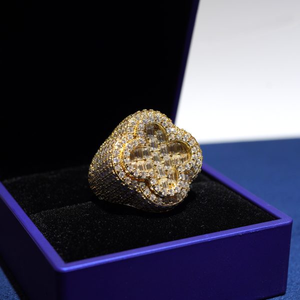 A fully iced clover ring Diamond dancing